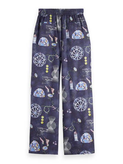 Gia - Mid rise wide leg elasticated trousers in block print