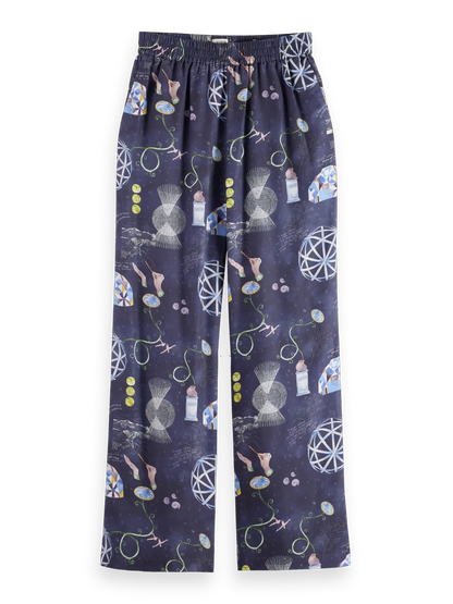 Gia - Mid rise wide leg elasticated trousers in block print