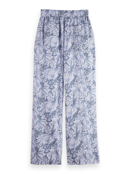 Gia - Mid rise wide leg elasticated trousers in block print