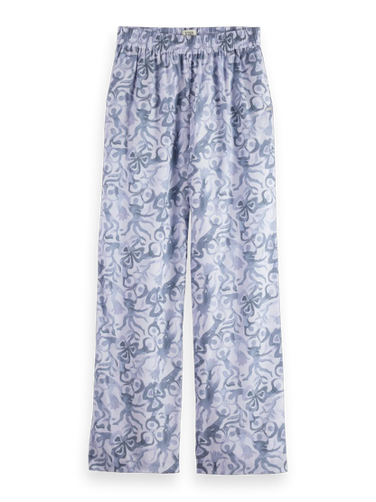 Gia - Mid rise wide leg elasticated trousers in block print