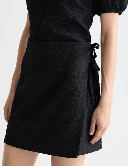 Wrapped and tied mini skirt