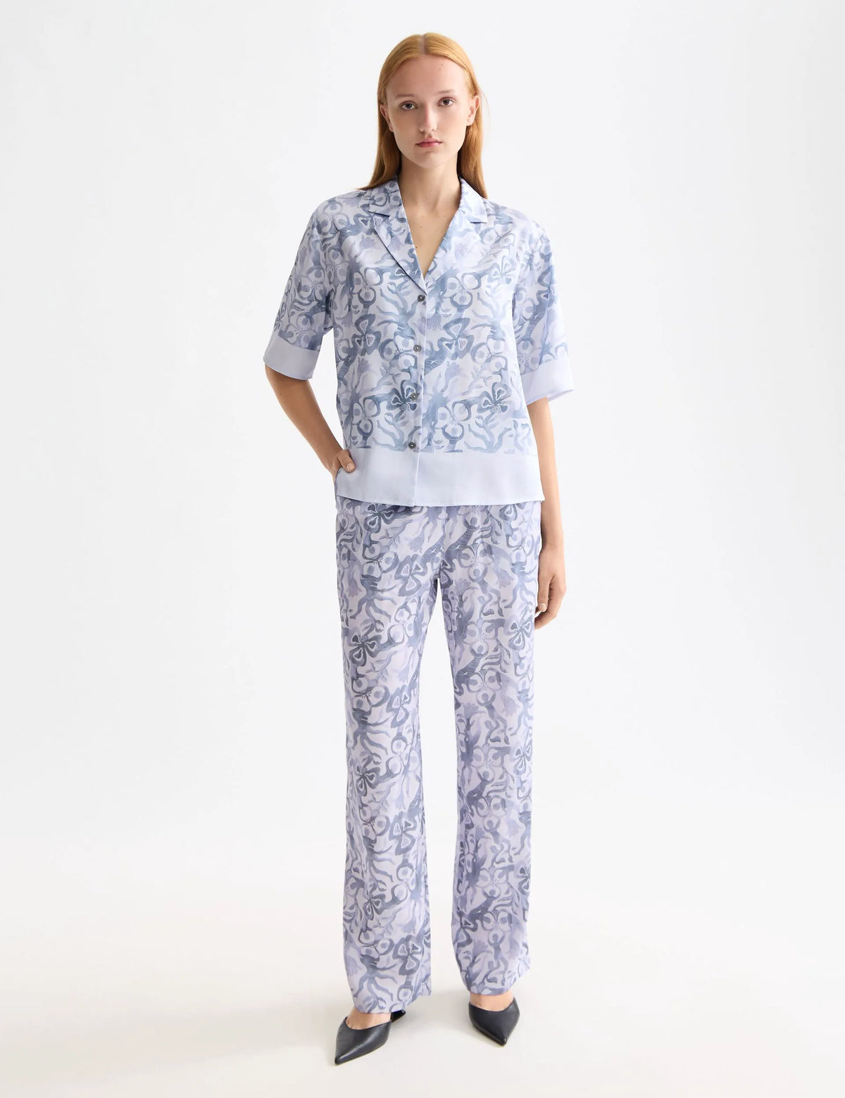 Gia - Mid rise wide leg elasticated trousers in block print