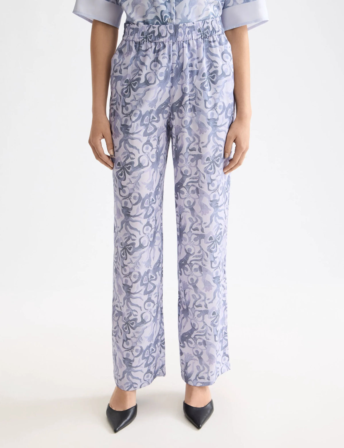 Gia - Mid rise wide leg elasticated trousers in block print