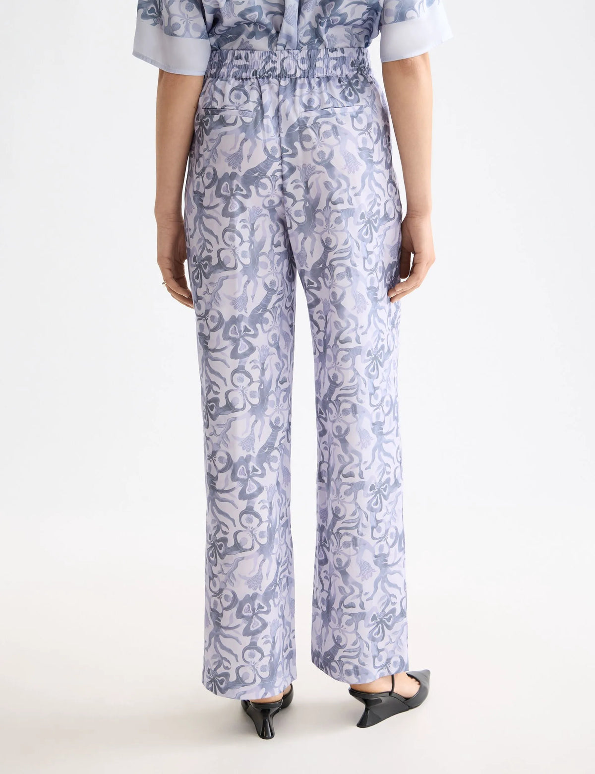 Gia - Mid rise wide leg elasticated trousers in block print